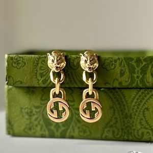 Gucci Tiger Double G Antique Gold /Brass Post Earrings